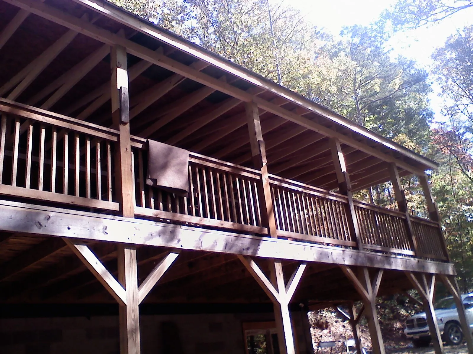 Timber framing under a new elevated porch and deck — Roof Leak Repair in Palo Alto by Roofing Brothers